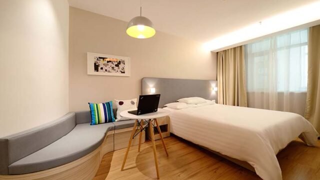 room with sofa table and bed
