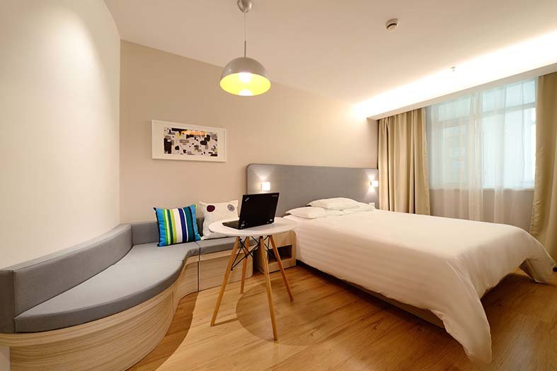 room with sofa table and bed